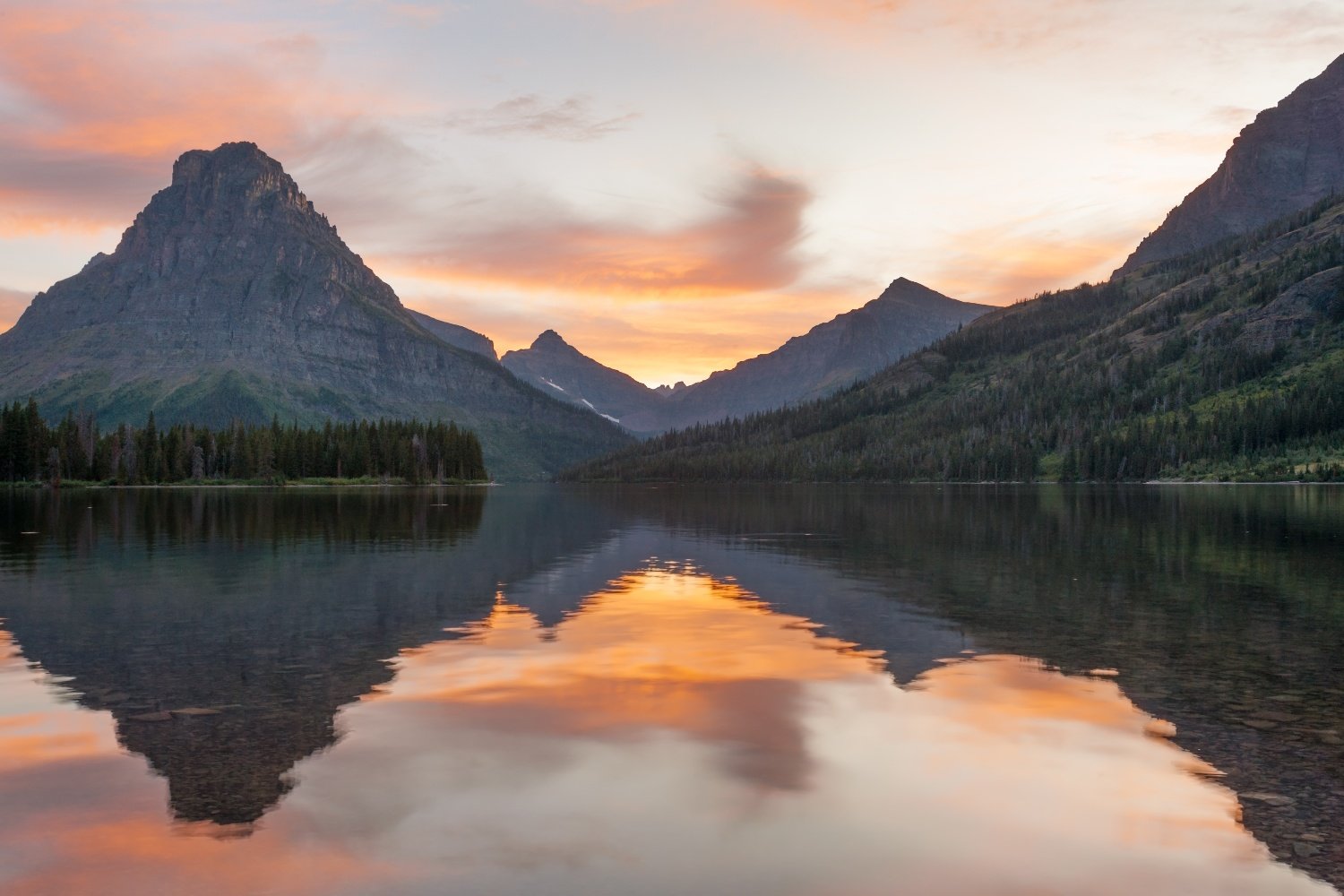 Mountain lake at sunset in Glacier National Park